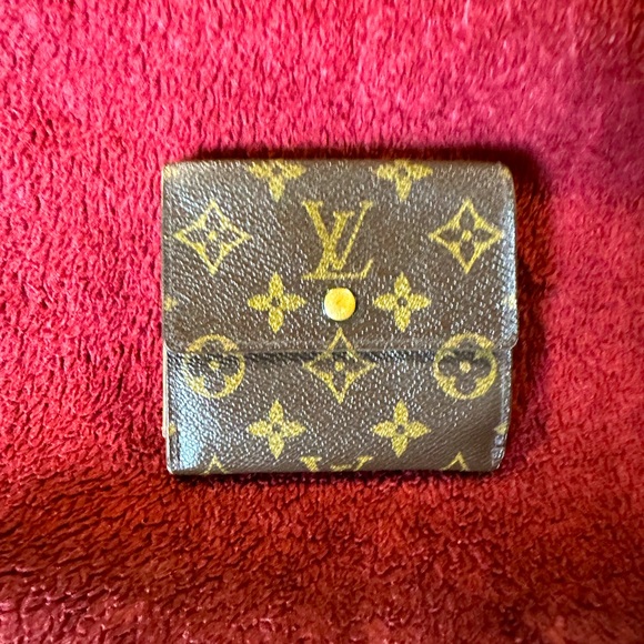 Louis Vuitton wallet in signature brown. Good condition